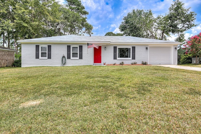 4073 Old Trail Rd, Augusta, GA 30907 - single story home featuring brick siding, an attached garage, a front lawn, and driveway