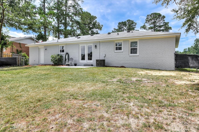 4073 Old Trail Rd, Augusta, GA 30907 - back of house with brick siding, a patio area, and french doors