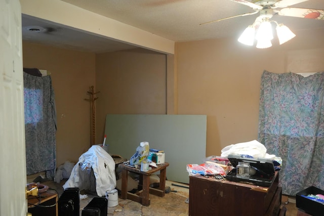 miscellaneous room featuring ceiling fan