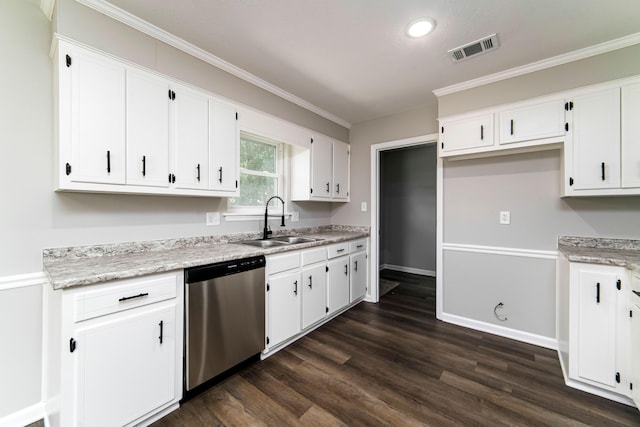 kitchen with stainless steel dishwasher, white cabinets, and sink