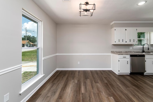 kitchen featuring white cabinetry, dishwasher, dark wood-type flooring, and an inviting chandelier