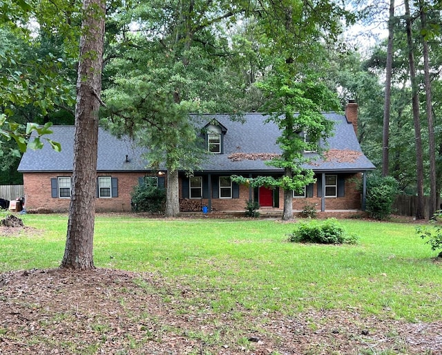 view of front of property with a front lawn