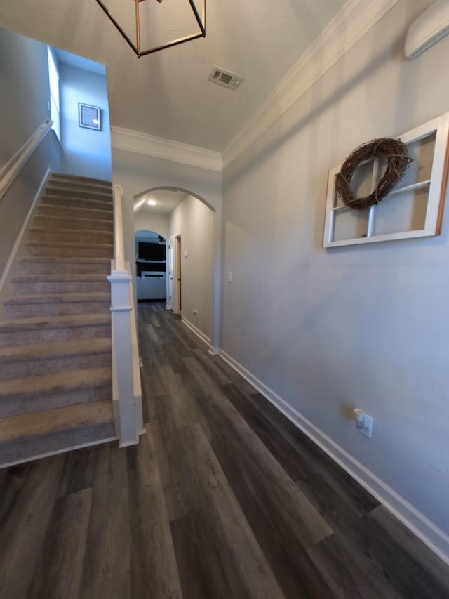 corridor with crown molding and dark hardwood / wood-style floors