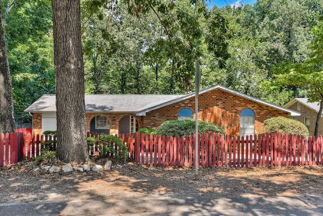 view of front of property featuring a garage