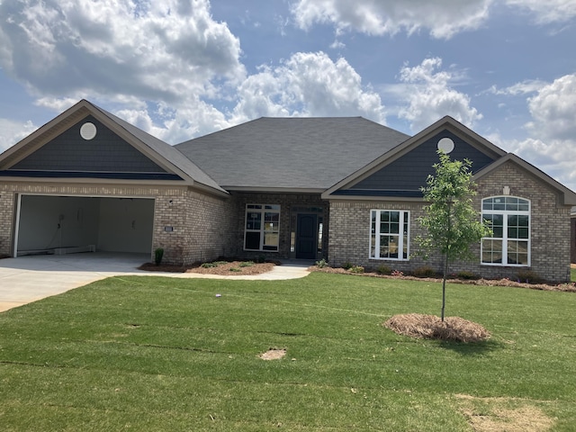 3351 Stockport Dr, Hephzibah, GA 30815 - single story home with brick siding, driveway, a front yard, and a garage