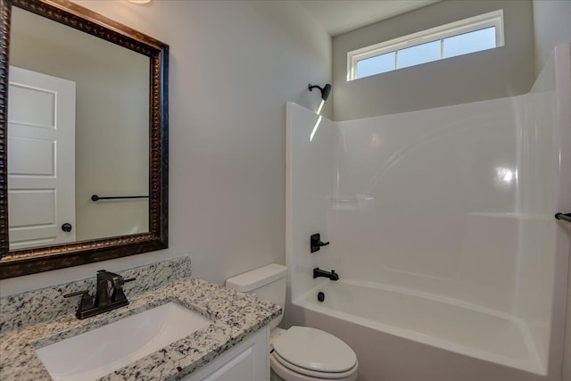 full bathroom featuring vanity, shower / bathtub combination, and toilet