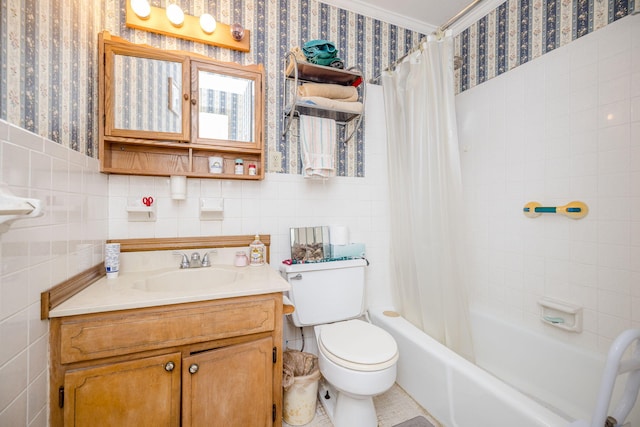 full bathroom with toilet, wallpapered walls, shower / bath combination with curtain, and vanity
