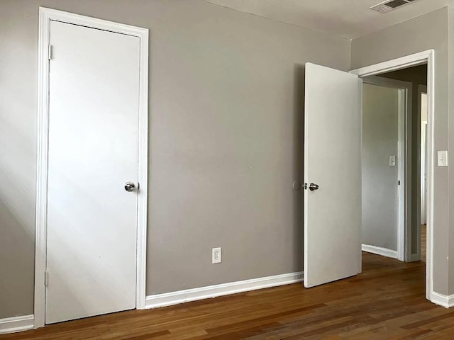 506 Weed St, Augusta, GA 30904 - unfurnished bedroom featuring wood finished floors and baseboards