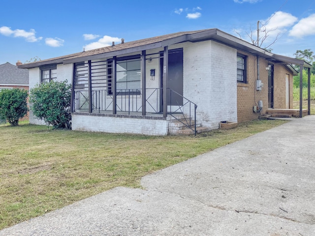 506 Weed St, Augusta, GA 30904 - ranch-style home featuring brick siding, a front yard, and a porch