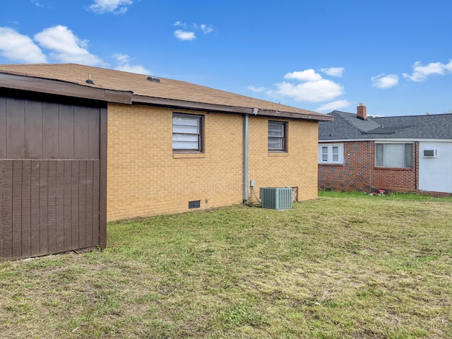 506 Weed St, Augusta, GA 30904 - view of side of home with crawl space, brick siding, a yard, and roof with shingles