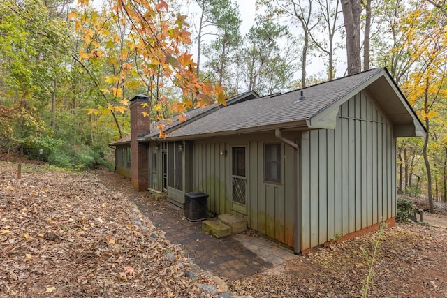 view of home's exterior with central AC unit