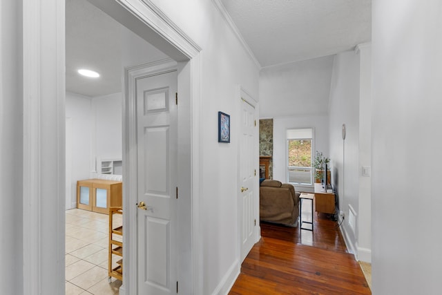 corridor featuring tile patterned floors