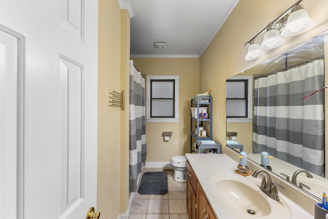 bathroom featuring tile patterned floors, vanity, toilet, and ornamental molding