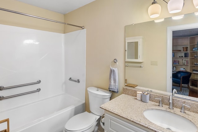 full bathroom featuring shower / bathing tub combination, vanity, and toilet