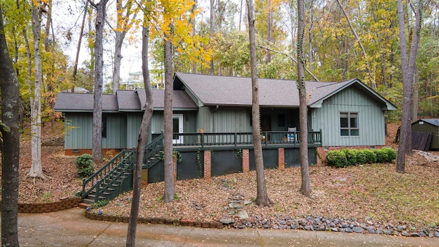 ranch-style home with a deck