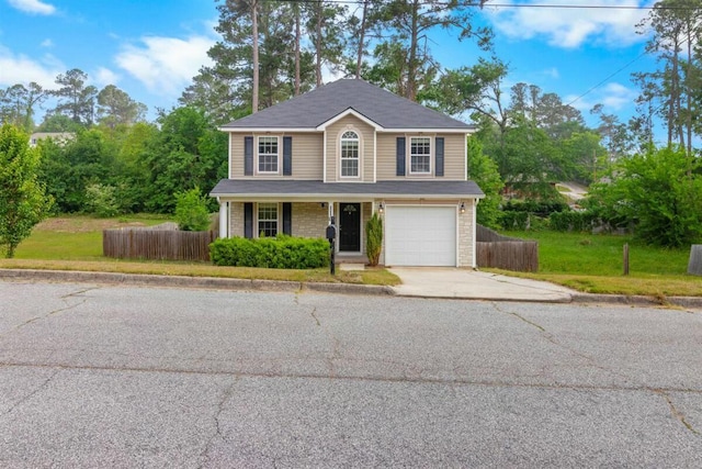 2409 Par Dr, Augusta, GA 30906 - traditional-style home featuring fence, an attached garage, driveway, and a front yard
