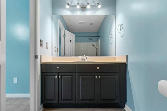 2409 Par Dr, Augusta, GA 30906 - full bathroom featuring baseboards, vanity, a shower, and visible vents