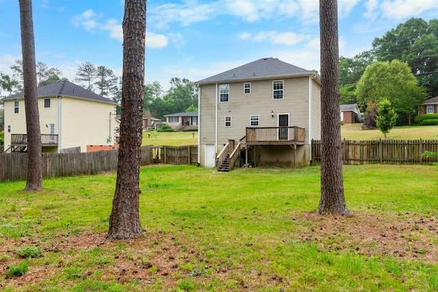 2409 Par Dr, Augusta, GA 30906 - rear view of property featuring a fenced backyard, stairway, a yard, and a deck