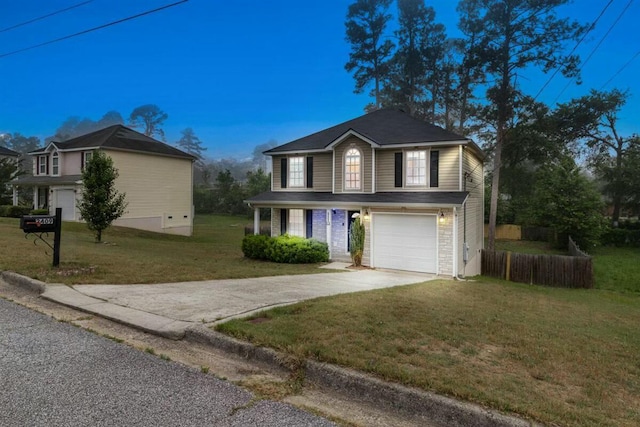 2409 Par Dr, Augusta, GA 30906 - traditional-style home featuring a garage, a front lawn, fence, and concrete driveway