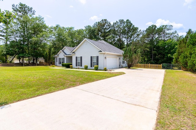 219 Devonshire Dr, Thomson, GA 30824 - ranch-style home with concrete driveway and an attached garage