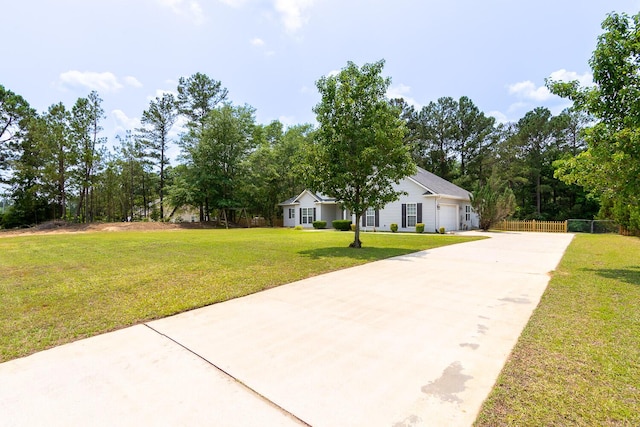 219 Devonshire Dr, Thomson, GA 30824 - view of front of property with a garage and concrete driveway