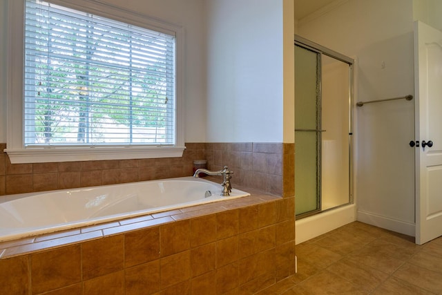 219 Devonshire Dr, Thomson, GA 30824 - full bathroom featuring a shower stall, plenty of natural light, a bath, and tile patterned flooring
