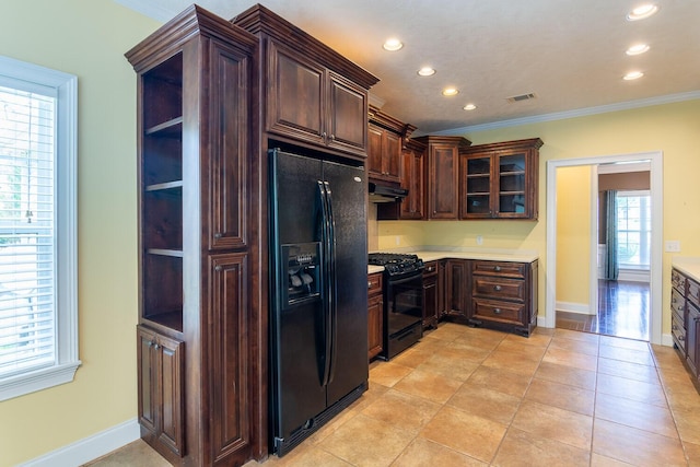 219 Devonshire Dr, Thomson, GA 30824 - kitchen with black appliances, crown molding, recessed lighting, light countertops, and under cabinet range hood
