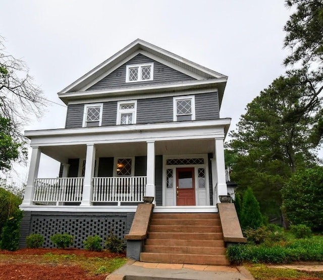 greek revival inspired property featuring covered porch