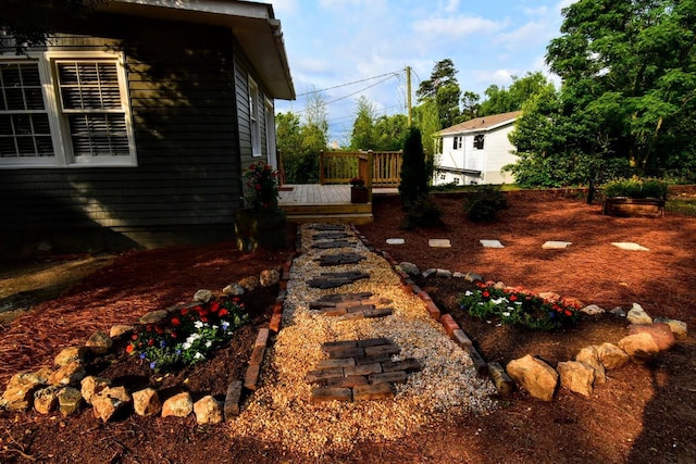 view of yard with a deck