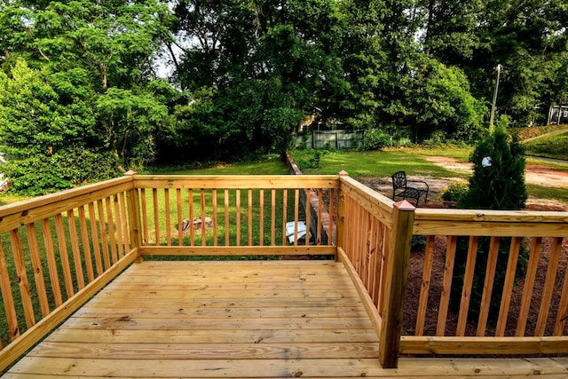 deck featuring a lawn