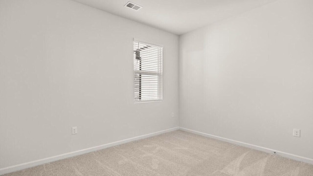 empty room with light carpet