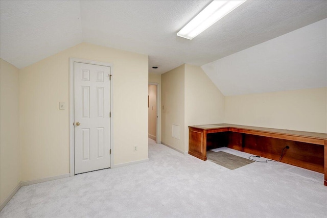 4482 Persimmon St, Evans, GA 30809 - additional living space with lofted ceiling, carpet flooring, a textured ceiling, and baseboards