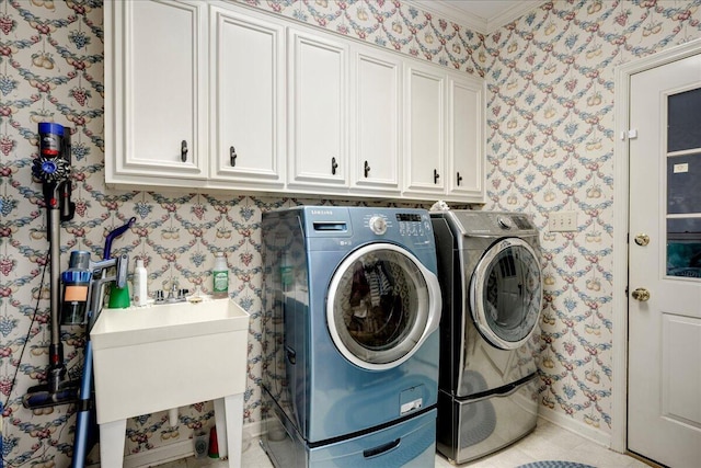 4482 Persimmon St, Evans, GA 30809 - washroom with wallpapered walls, cabinet space, independent washer and dryer, baseboards, and ornamental molding