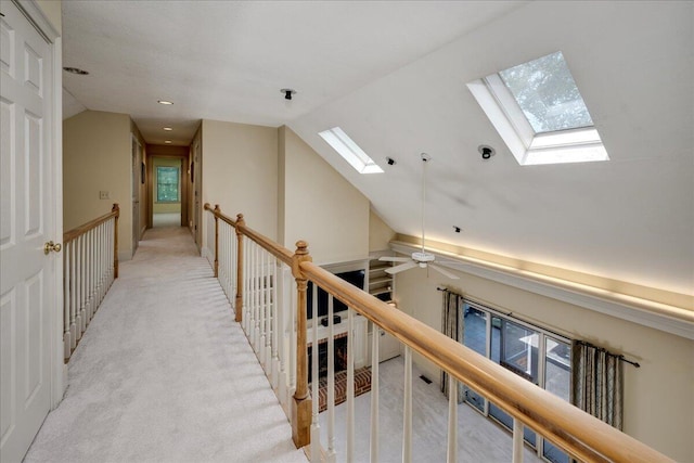 4482 Persimmon St, Evans, GA 30809 - corridor featuring a skylight, vaulted ceiling, and light carpet
