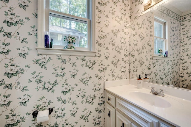 4482 Persimmon St, Evans, GA 30809 - bathroom with wallpapered walls, vanity, and plenty of natural light