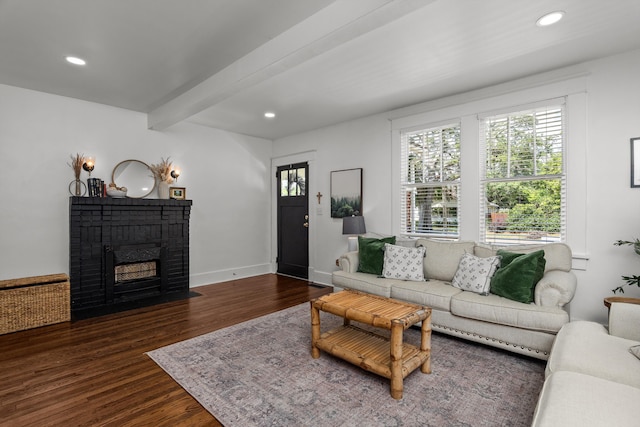 1512 Johns Rd, Augusta, GA 30904 - living area with wood finished floors, a brick fireplace, recessed lighting, beam ceiling, and baseboards