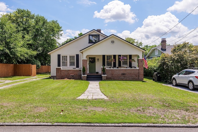 1512 Johns Rd, Augusta, GA 30904 - bungalow-style home featuring a porch, stucco siding, brick siding, and a chimney