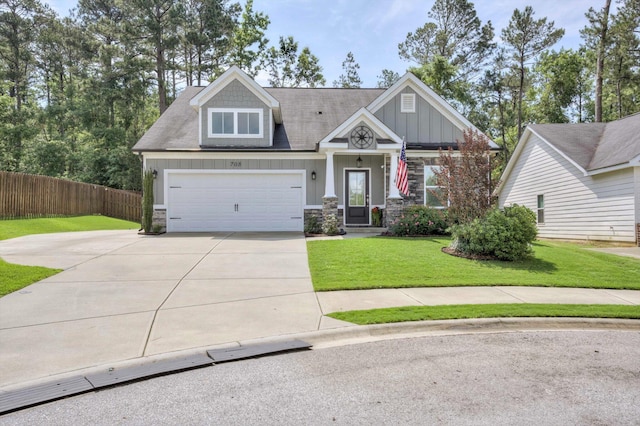 708 Shea Ct, Evans, GA 30809 - craftsman-style house featuring board and batten siding, concrete driveway, and stone siding