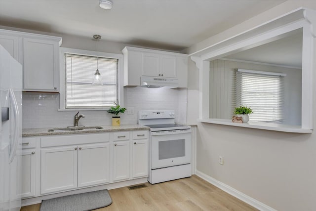 kitchen featuring visible vents, white cabinets, a sink, white appliances, and under cabinet range hood