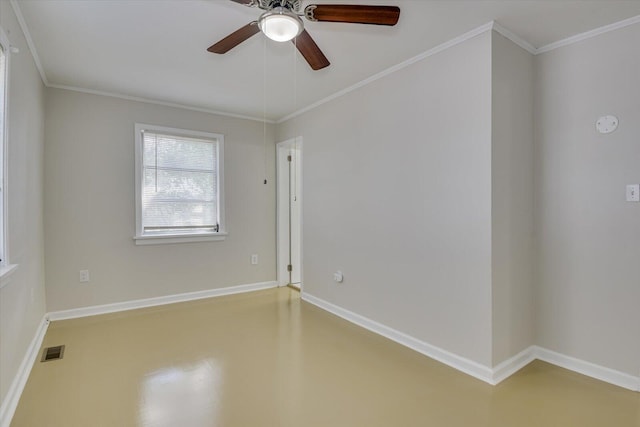 spare room with baseboards, visible vents, a ceiling fan, and ornamental molding