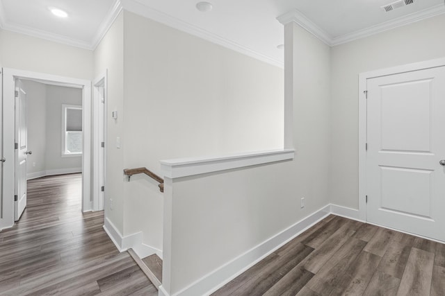 hall featuring crown molding, an upstairs landing, wood finished floors, and baseboards