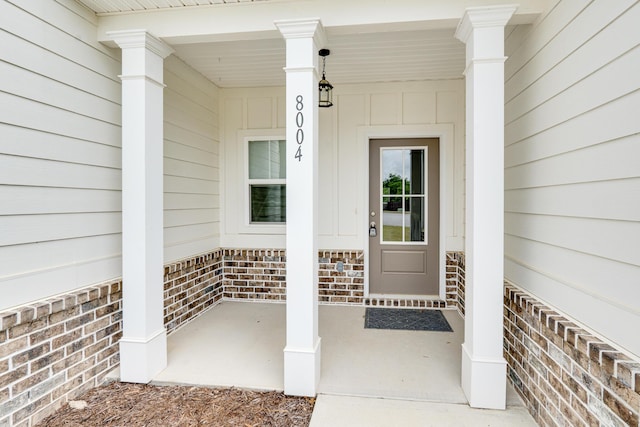 property entrance with a porch