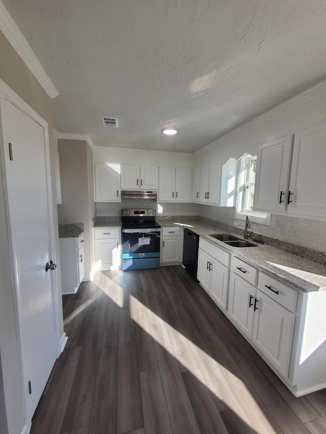 kitchen featuring dishwasher, stainless steel electric stove, sink, dark hardwood / wood-style flooring, and white cabinetry