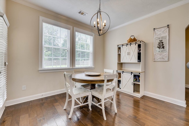 4074 Ellington Dr, Grovetown, GA 30813 - dining room with baseboards, a chandelier, dark wood finished floors, and crown molding