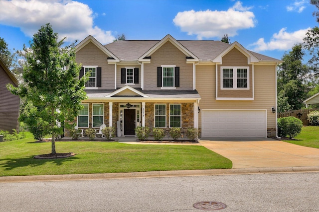 4074 Ellington Dr, Grovetown, GA 30813 - view of front facade with an attached garage, stone siding, concrete driveway, and a porch