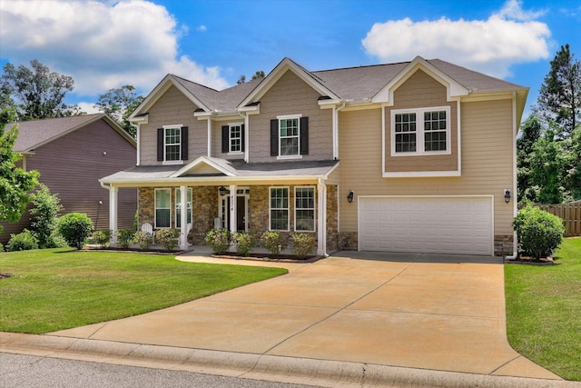 4074 Ellington Dr, Grovetown, GA 30813 - craftsman house featuring stone siding, a garage, and driveway