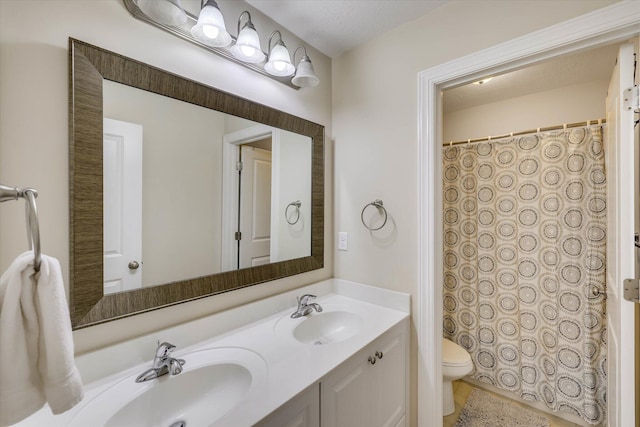 4074 Ellington Dr, Grovetown, GA 30813 - bathroom featuring double vanity, toilet, and a shower with curtain