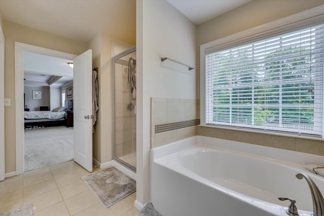 4074 Ellington Dr, Grovetown, GA 30813 - ensuite bathroom featuring a garden tub, a stall shower, tile patterned floors, and baseboards