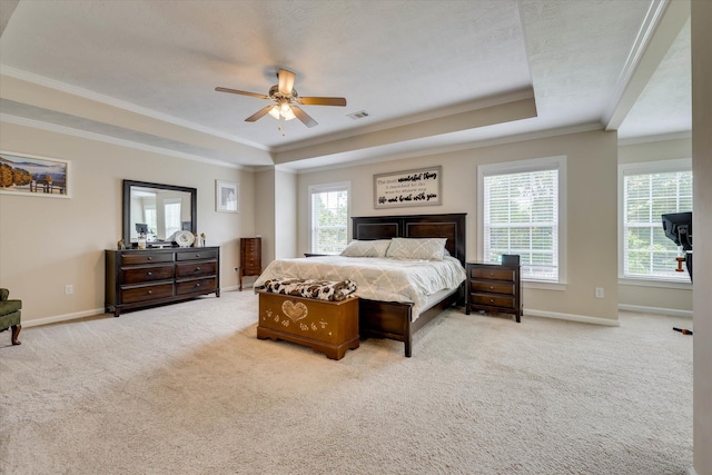 4074 Ellington Dr, Grovetown, GA 30813 - bedroom featuring a tray ceiling, crown molding, baseboards, carpet floors, and ceiling fan