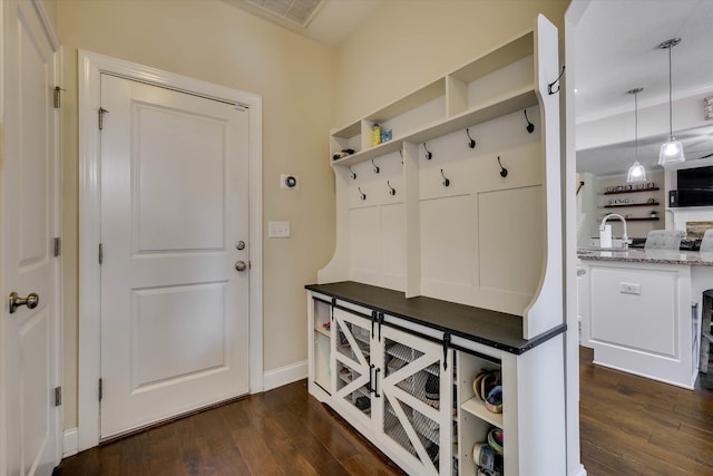 4074 Ellington Dr, Grovetown, GA 30813 - mudroom featuring dark wood-type flooring, a sink, and baseboards
